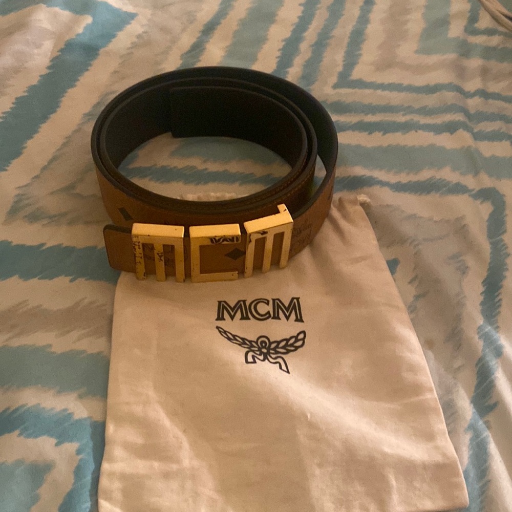 Mcm men’s belt leather excellent condition buckle has some natural fade